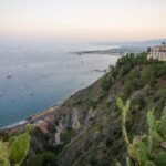 Sunset view of the Sicilian coast from Taormina