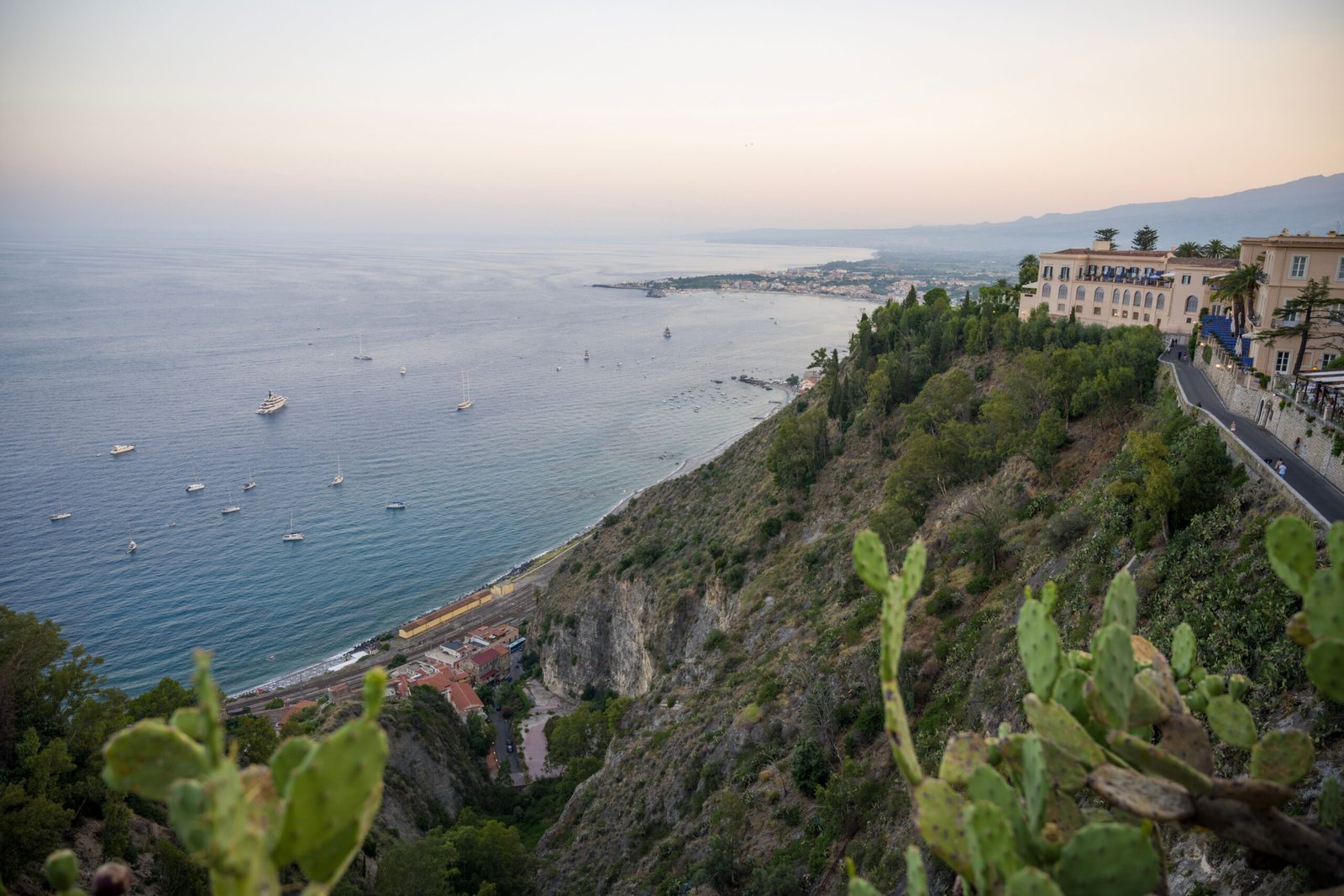 Sunset view of the Sicilian coast from Taormina