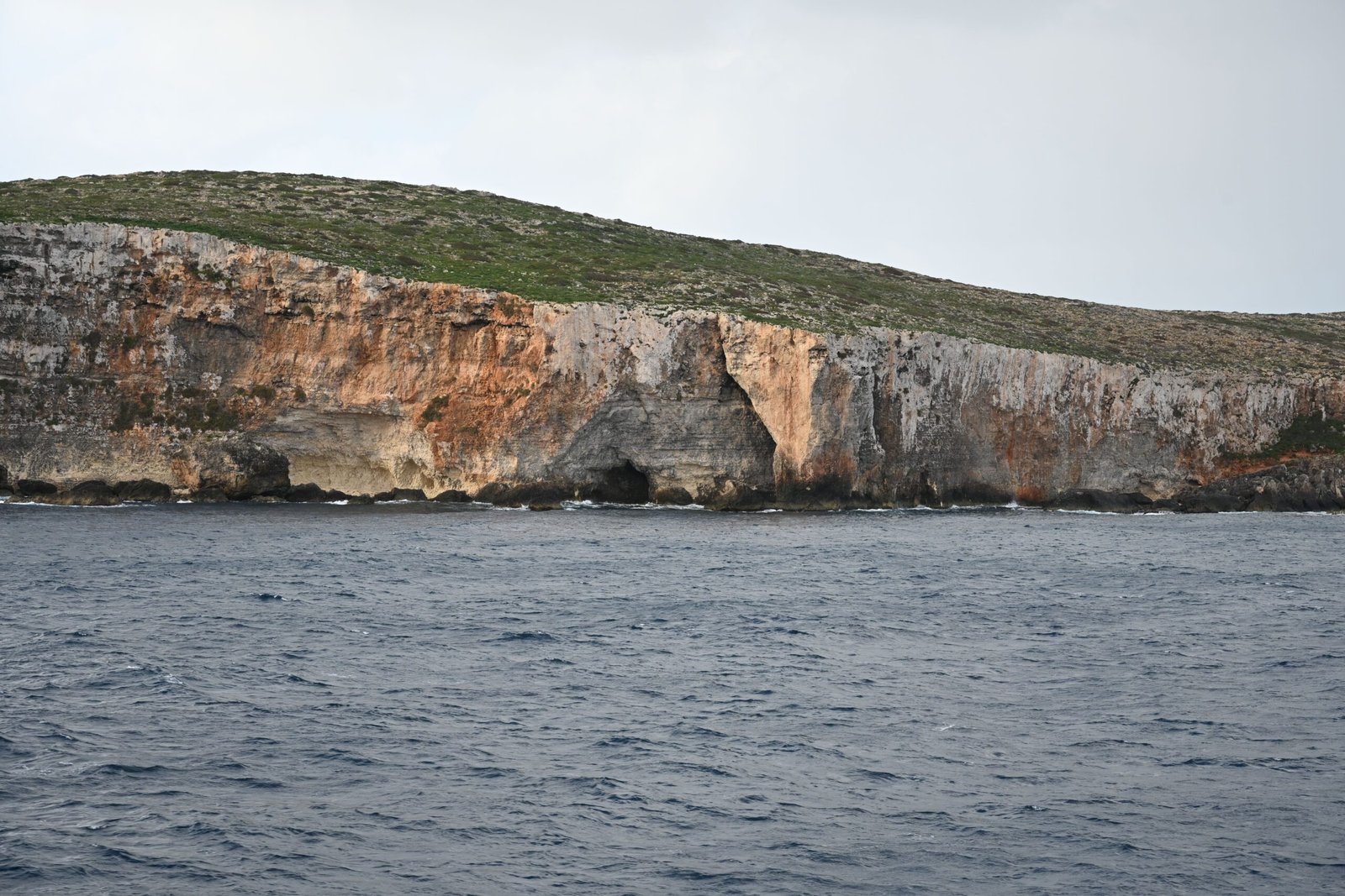 Calm turquoise sea around the island of Comino in Malta