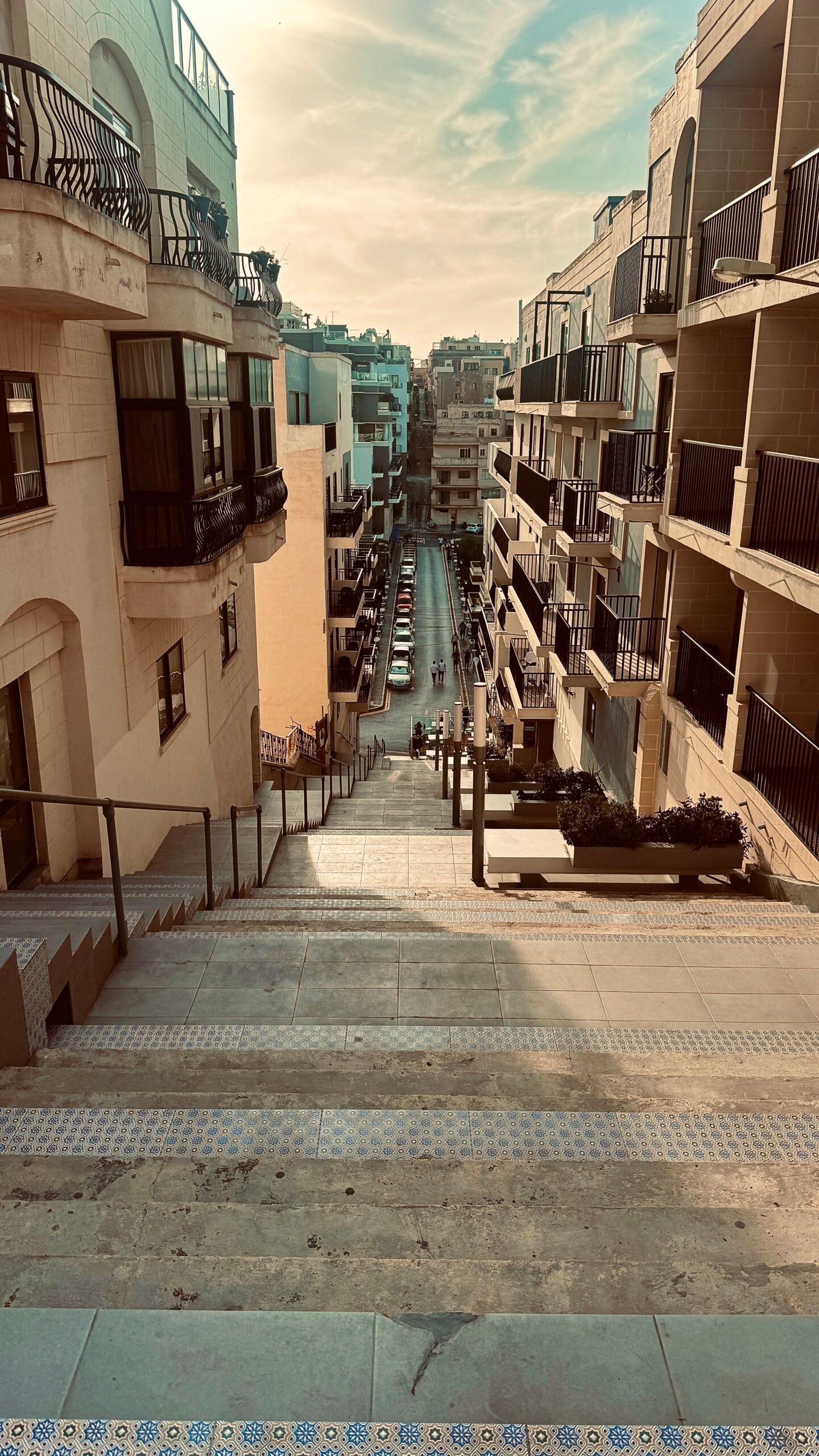 Charming stairway street scene in Mellieha, Malta showing Mediterranean architecture